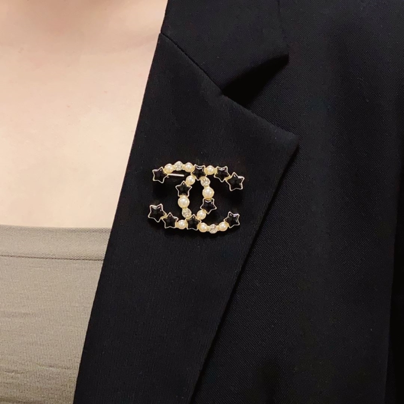 Ch**el brooches